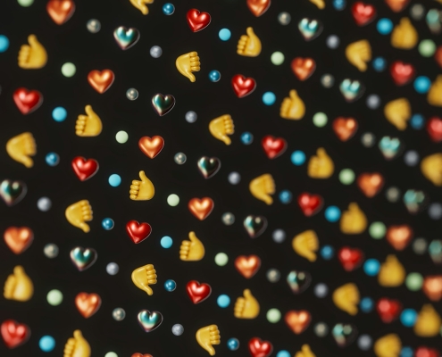 a close up of a bunch of hearts on a black background
